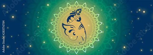 beautiful lord ganesha face on glowing banner