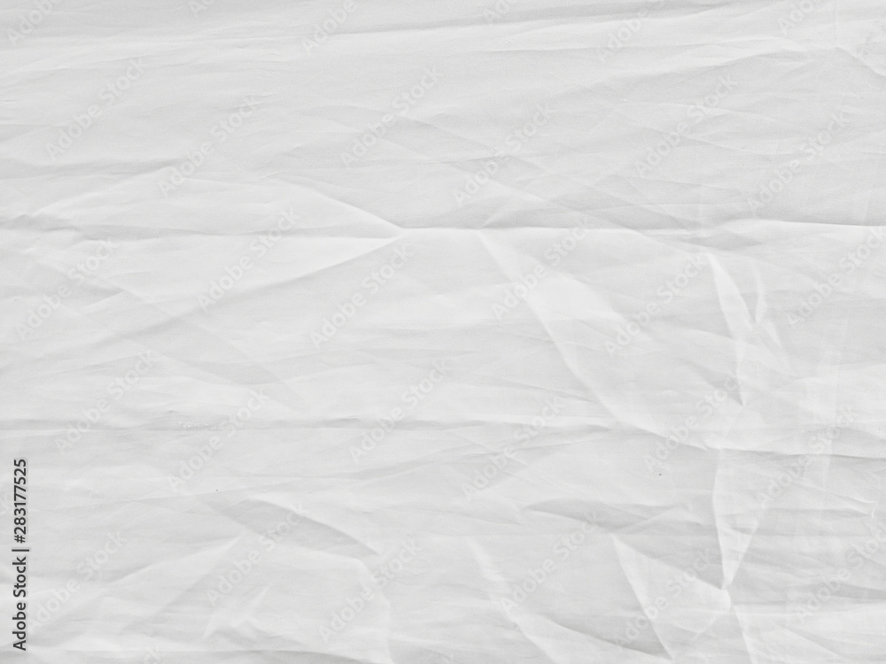 Soft white wrinkled fabric background