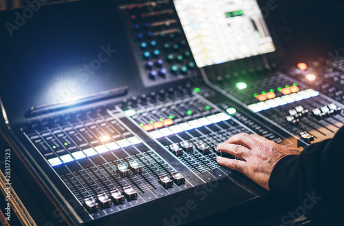 Canvas Print Lights technician working at event concert - Sound system and lighting during mu