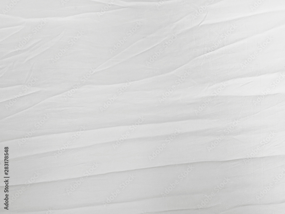 Soft white wrinkled fabric background