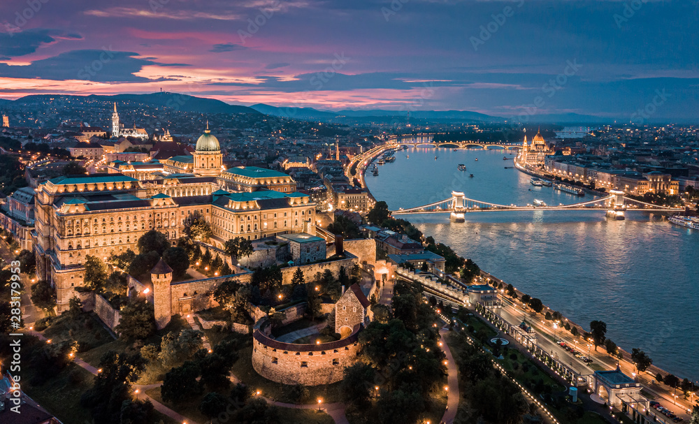 Budapest Hungary - Aerial panoramic skyline view of Budapest at sunset with Buda Castle Royal Palace, Szechenyi Chain Bridge, Parliament, Matthias Church over Danube river
