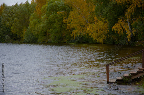 river on the background of the autumn landscape