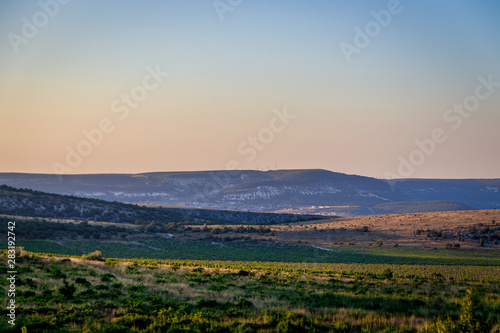 Russian open spaces. Crimea. Field. Summer Russian landscapes. . Grass and sky. Background summer landscape. Crimean fields