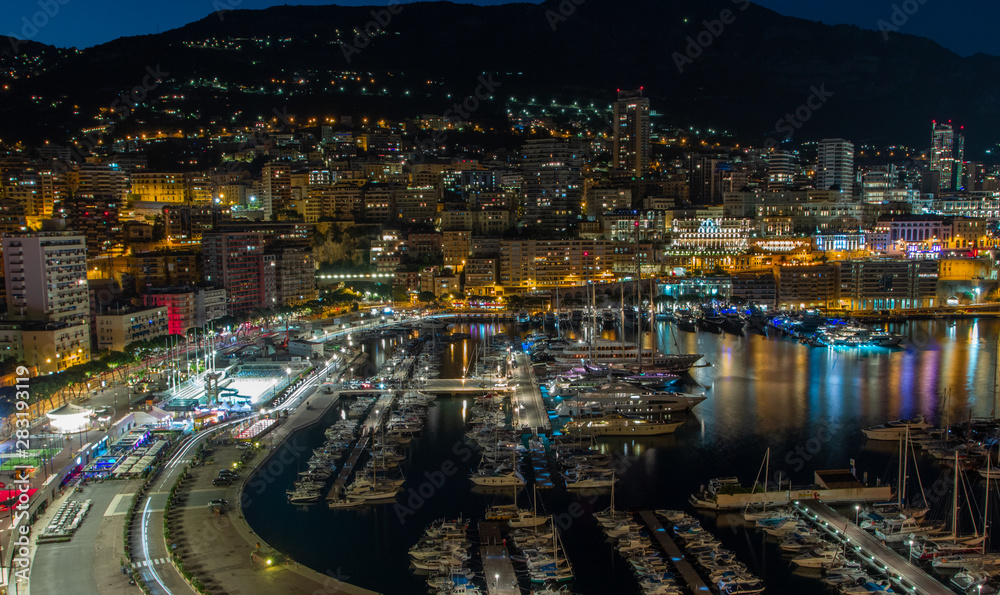 Panoramic view of Monaco with great port and luxury yachts. Monaco is a popular travel destination and a wealth symbol on France Mediterranean coastline.