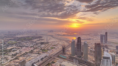 Downtown of Dubai in the morning timelapse during sunrise. Aerial view with towers and skyscrapers