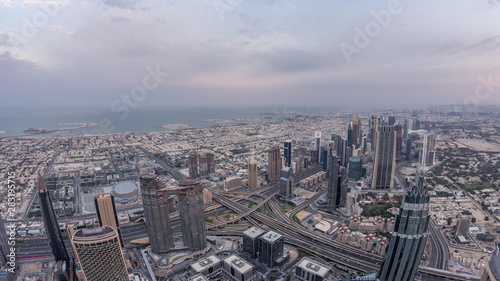Downtown of Dubai night to day timelapse before sunrise. Aerial view with towers and skyscrapers © neiezhmakov