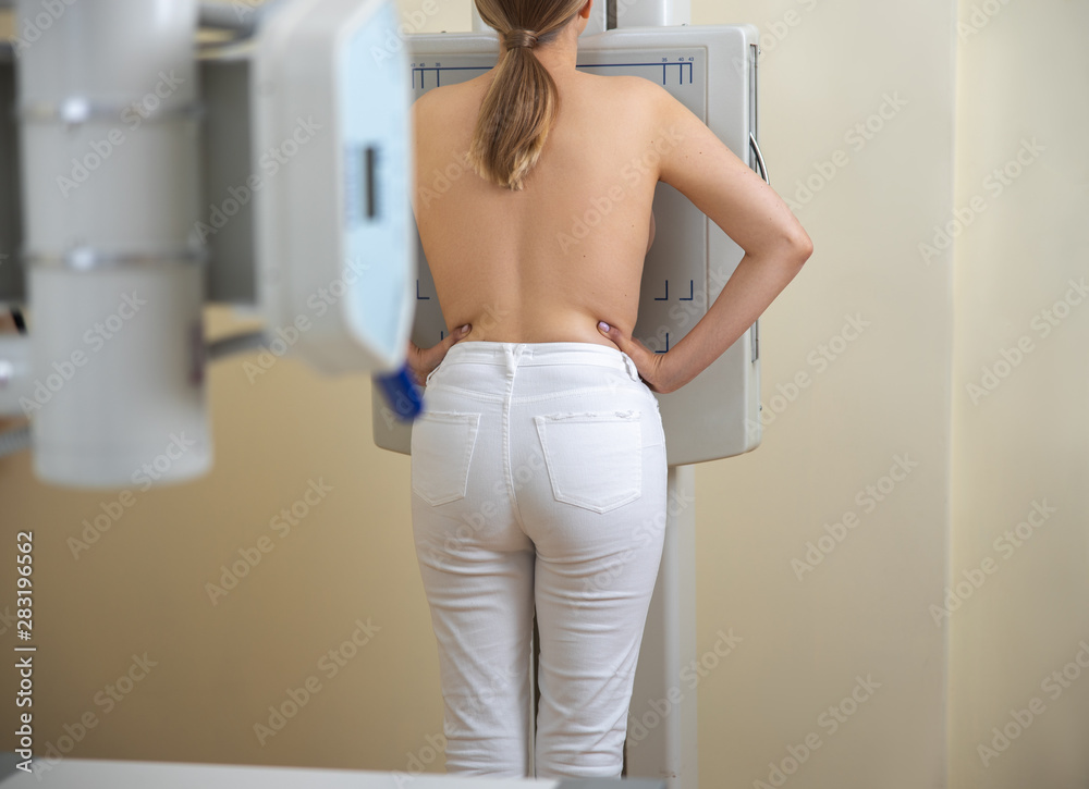 Young woman having mammography scan at hospital Young woman having mammography scan at hospital