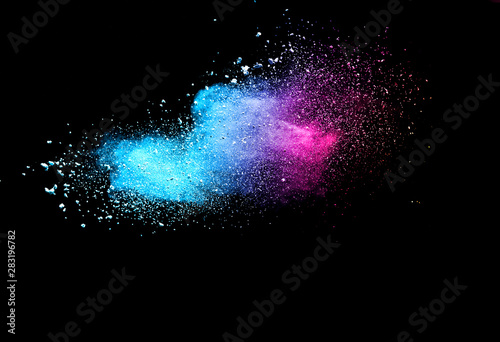 Explosion of colored powder isolated on black background. Abstract colored background. holi festival.