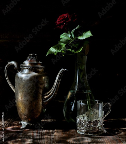  small production with a rose, dark consecration, subject shooting,