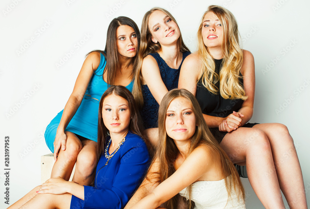 many girlfriends hugging celebration on white background, smiling talking chat close up, lifestyle people concept many girlfriends hugging celebration on white background, smiling talking chat close up, lifestyle people concept