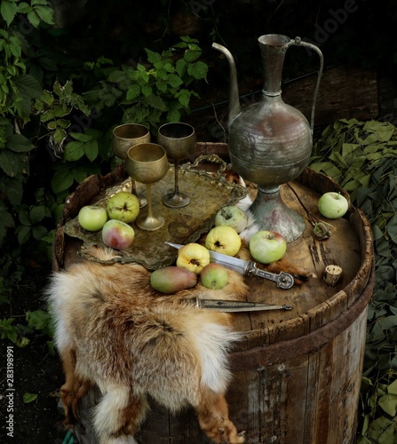  beautiful and atmospheric still life with apples on a barrel, top view, subject shooting