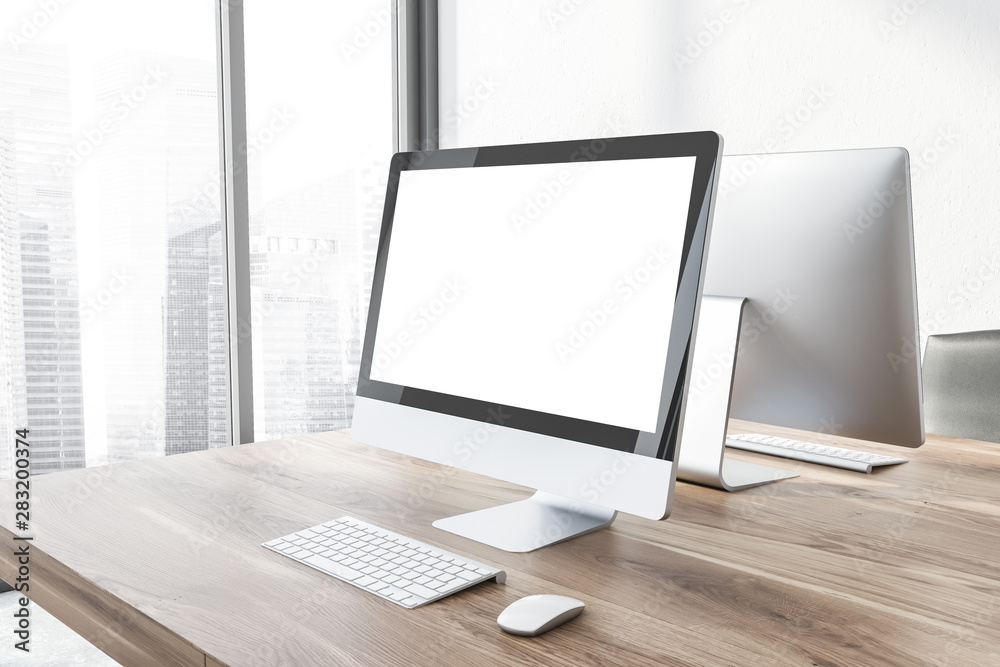 Fototapeta premium Mock up computer screen on wooden office table