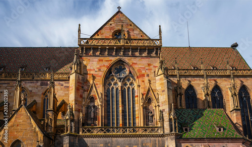 St Martin Church in Colmar, Haut Rhin in Alsace, France. View of the city colmar in france famous for its colorful houses and small streets along the river and the gigantic Gothic cathedral.