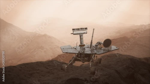 Oppotunity Mars exploring the surface of red planet. Elements of this image furnished by NASA photo