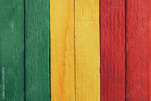 Background wood green, yellow, red old retro vintage style, rasta reggae flag