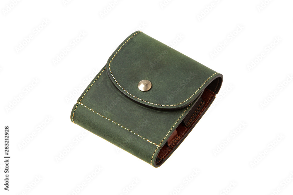 Leather wallet isolated on white background. Luxury leather wallet on a rivet button on a light back. Green leather wallet. Leather wallet isolated on white background. Luxury leather wallet on a rivet button on a light back. Green leather wallet.