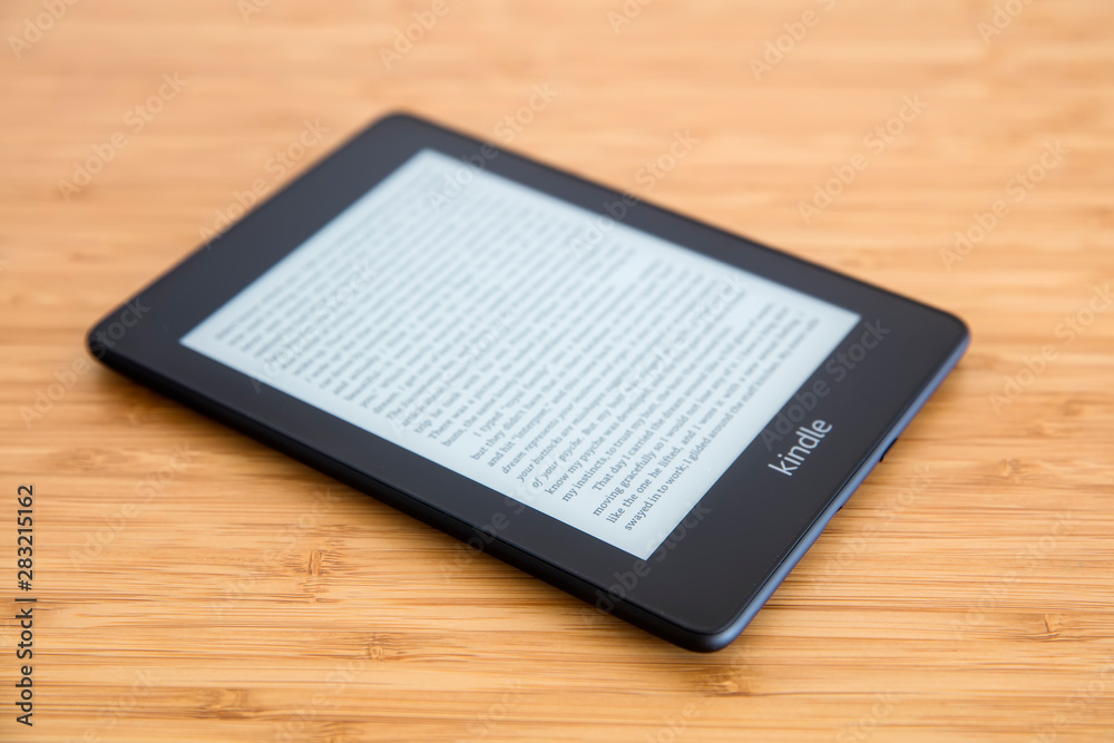 Amazon Kindle ebook reader. It s a serie of e-readers designed and marketed by Amazon. foto de Stock Adobe Stock