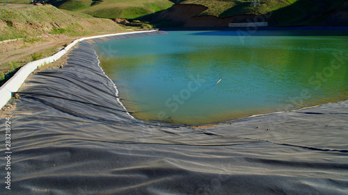 Foto Palandoken mountain, ponds and livestock in the village in Erzurum in summer