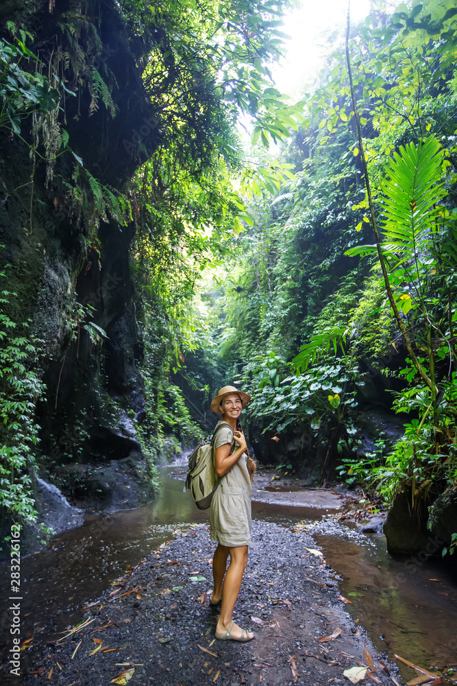 Woman in jungle on Bali, Indonesia Woman in jungle on Bali, Indonesia