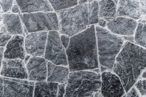 Rough granite background. Background texture of stone wall.