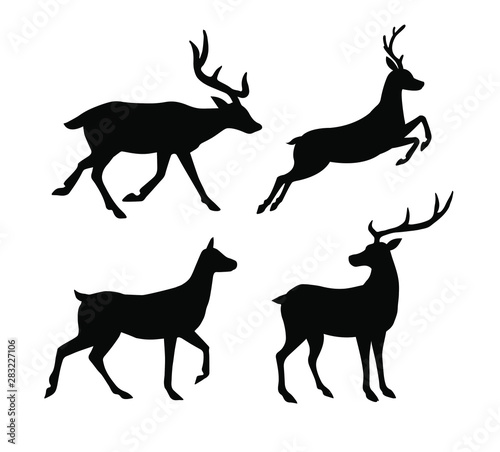 Vector set collection of flat black silhouette of deer isolated on white background