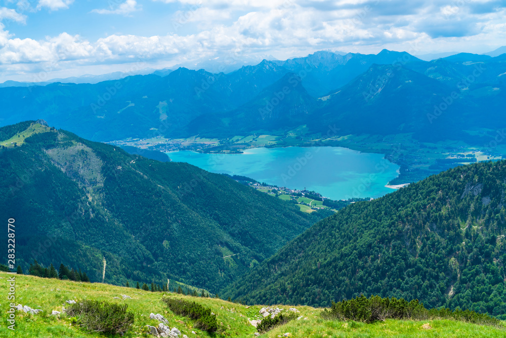 View of landscape with St. Wolfgang lake and mountains from Schafberg mountain, Austria