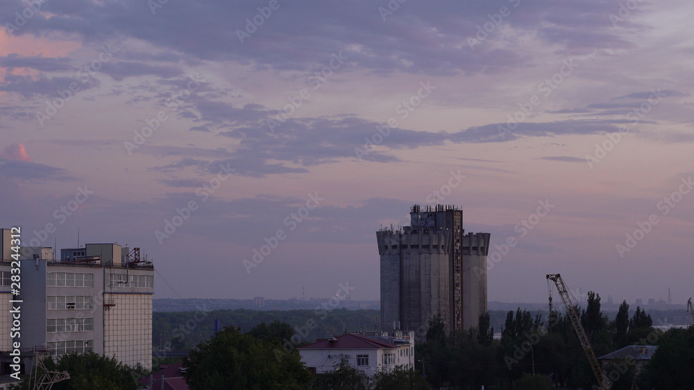 Beautiful sunset over a provincial town, city at dusk