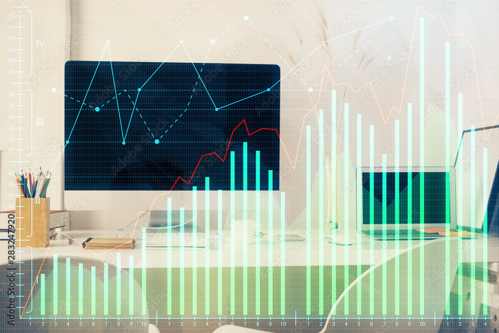 Financial graph colorful drawing and table with computer on background. Multi exposure. Concept of international markets. Financial graph colorful drawing and table with computer on background. Multi exposure. Concept of international markets.