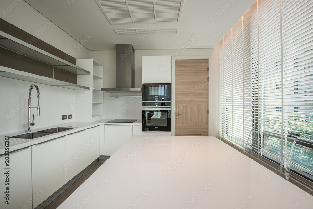 Modern kitchen interior with electric and microwave oven Modern kitchen interior with electric and microwave oven