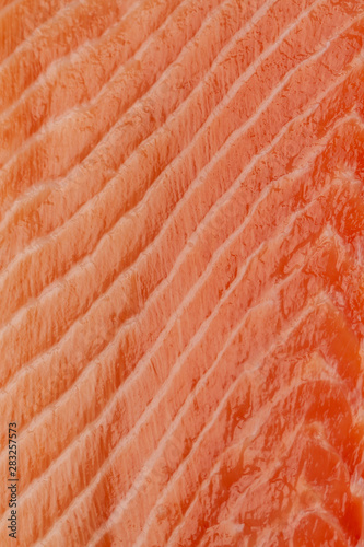 Texture of raw Norwegian salmon. Salmon close up. Fresh red salmon texture