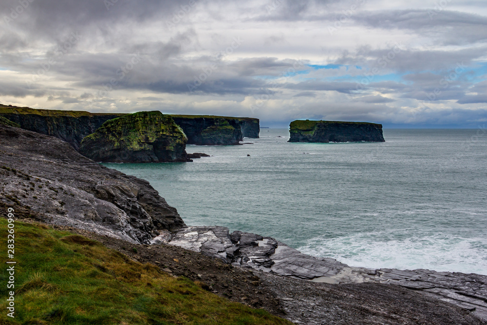 Surrounding the seaside town of Kilkee, County Clare, Ireland are interesting cliffs with many unique rock formations