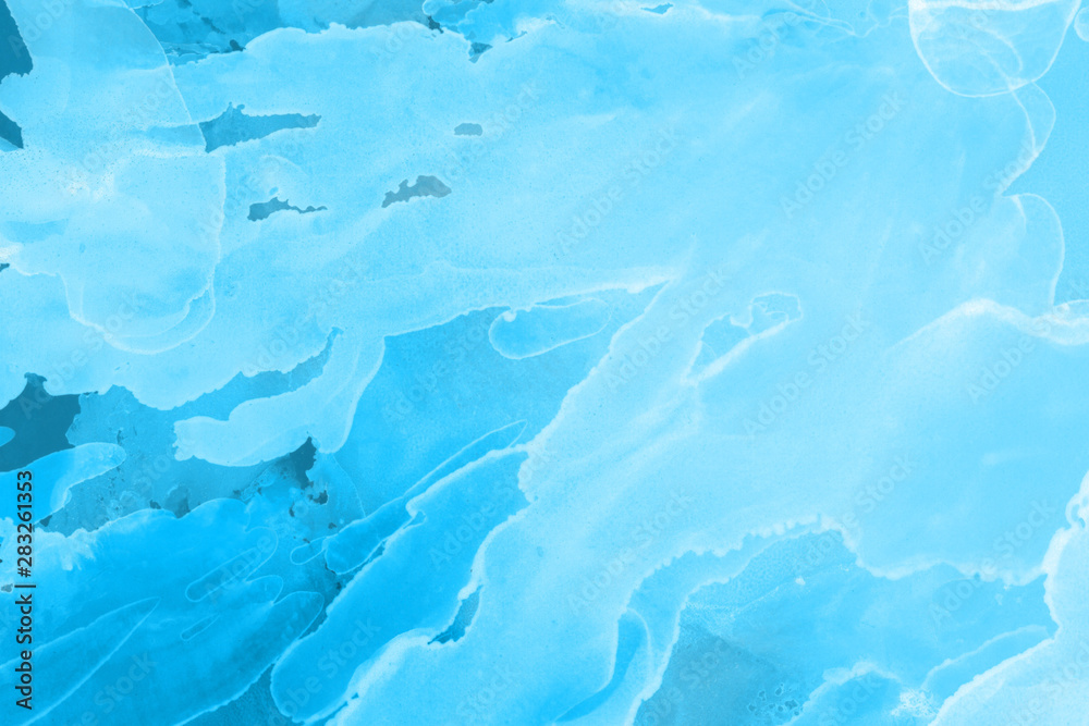 Obraz premium Hand painted blue alcohol ink background. Abstract delicate winter season texture. Contemporary wallpaper. 