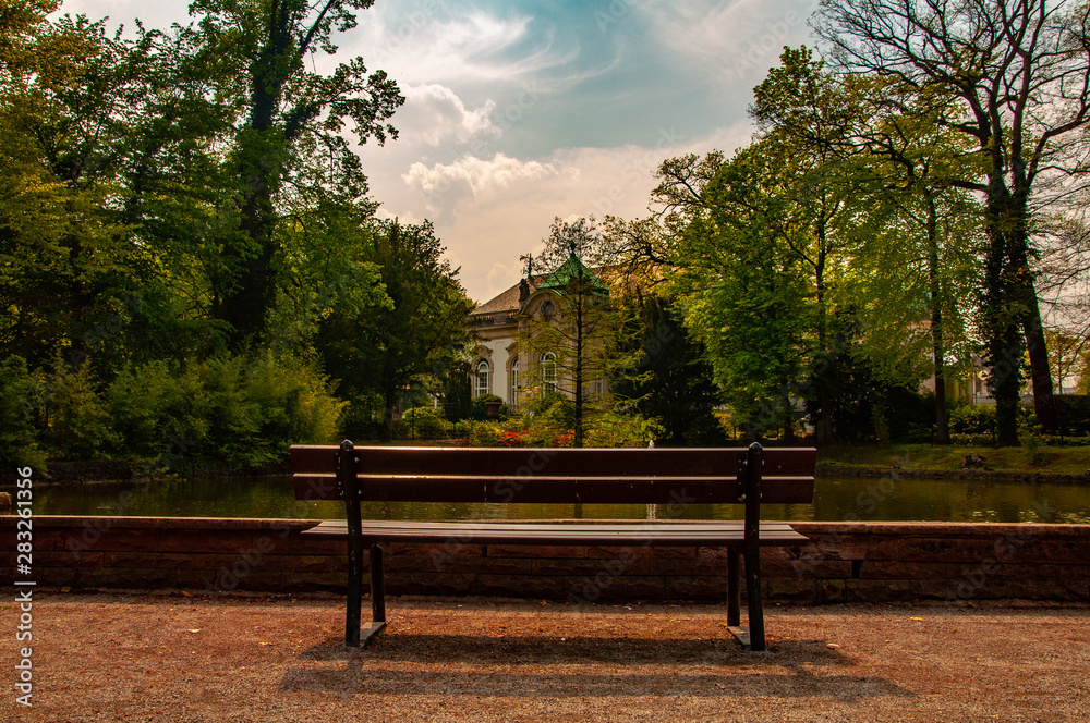 Empty bench in the park in city of Bad oeynhausen