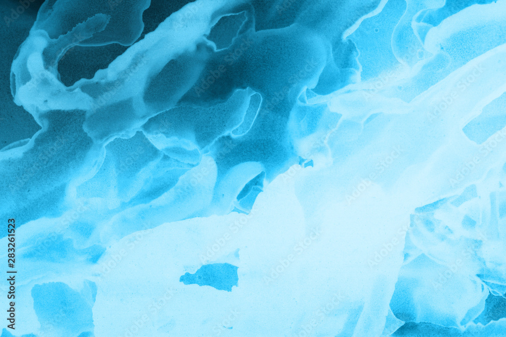 Obraz premium Hand painted blue alcohol ink background. Abstract delicate winter season texture. Contemporary wallpaper. 