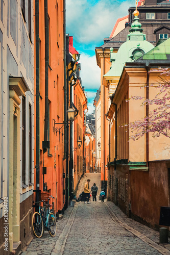 Narrow Prästgatan street in Gamla stan, Old Town in spring. Stockholm, Sweden