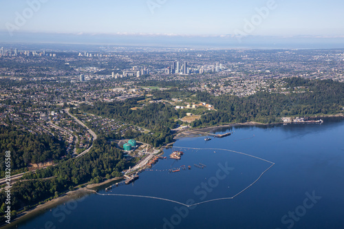 Aerial view of Oil Refinery Industry in Port Moody, Greater Vancouver, British Columbia, Canada. Taken during a sunny summer morning. © edb3_16