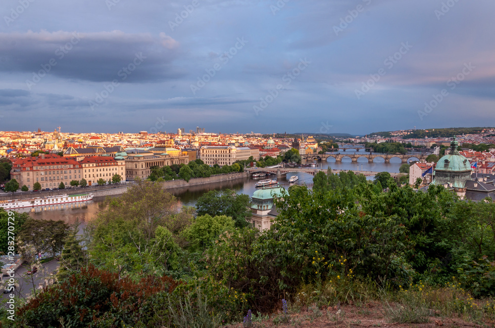 Panorama view of Prague skyline with bridges and Vltava river in the late afternoon. Prague, Czech Republic