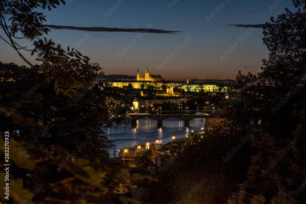 View of Prague Castle over Vltava river from Vysehrad Castle in the evening. Prague, Czech Republic