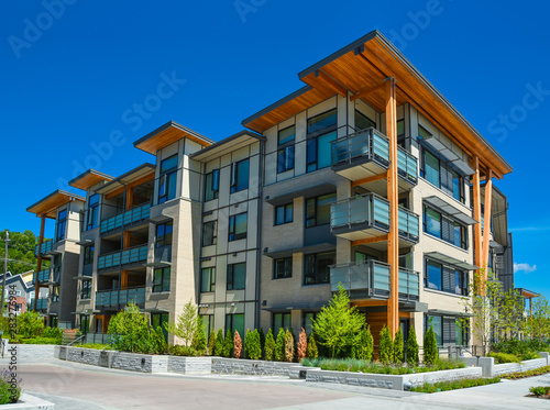 Brand new apartment building on sunny day in British Columbia, Canada.