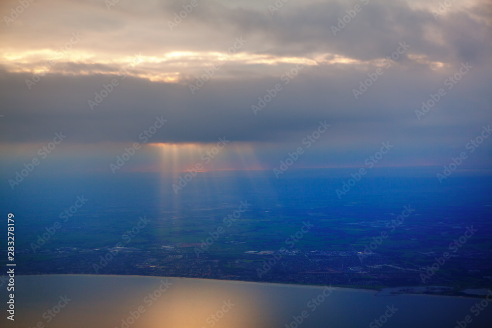 scenic view of clouds and rays 