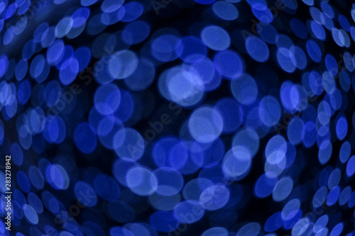 dark blue color abstract of blur and bokeh colorful light interior and night garden