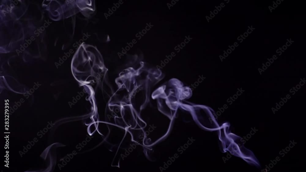 Slow motion smoke moving on black background. Slow motion smoke moving on black background.