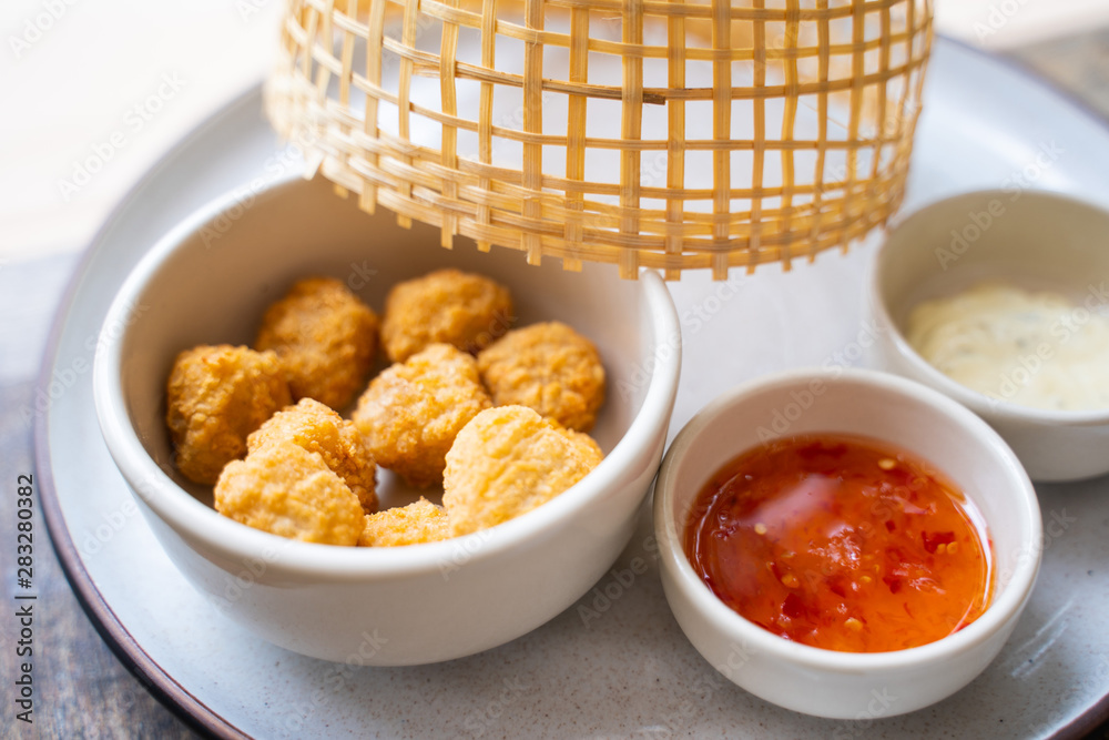 deep fried chicken nuggets with spicy sauce deep fried chicken nuggets with spicy sauce
