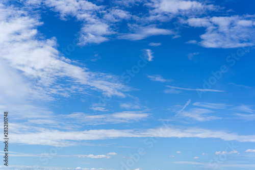 Blue sky and white puffy clouds