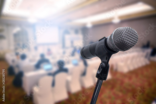Microphone over the blurred business people forum Meeting Conference Training Learning Coaching Concept, Blurred background