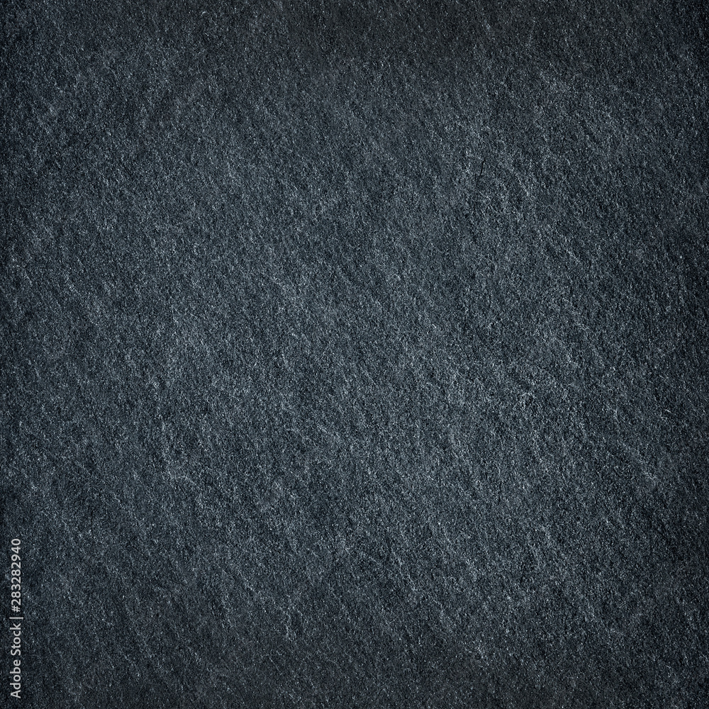 Dark gray black slate stone surface texture background Dark gray black slate stone surface texture background