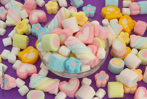 Top view of many colorful marshmallow candies 