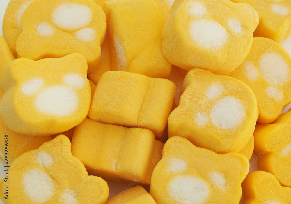 Bear shaped yellow marshmallows close up Bear shaped yellow marshmallows close up