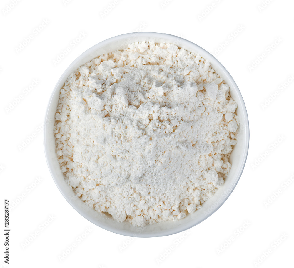 wheat flour in white bowl on white background wheat flour in white bowl on white background