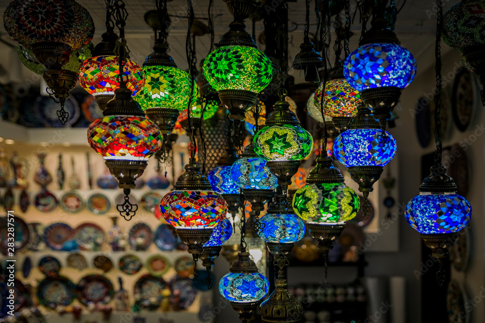 Traditional colorful Turkish oriental lamps and ceramics for sale in at a souvenir shop in Kotor old town in Montenegro